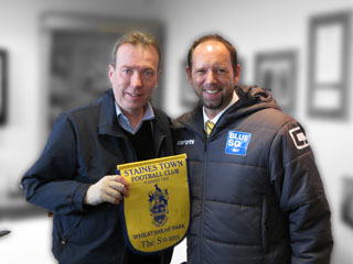 Mathew Boon with Gran Seger and the pennant, signed by father and son.